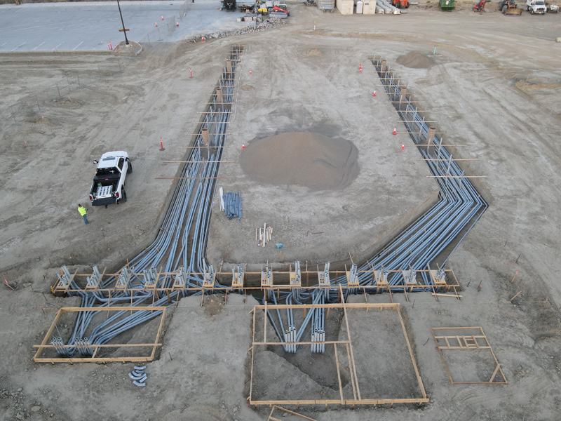 overhead view of pipes laid out for new construction project