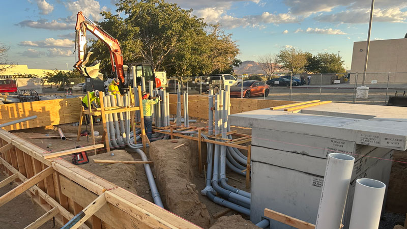 utility construction workers working at a job site